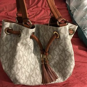 Michael Kors- stained inside corner bag